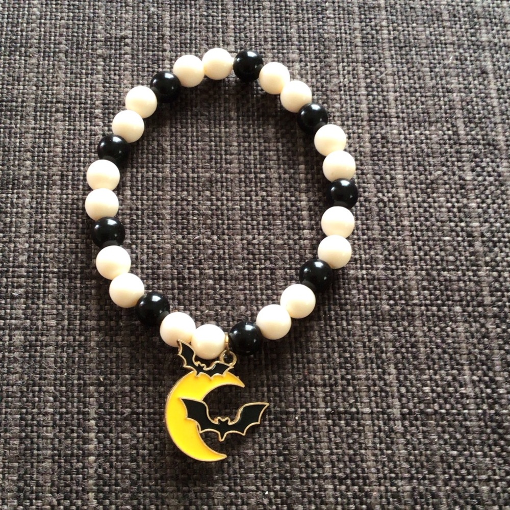Black and White Beaded Bracelet with Gold Moon Charm